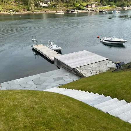 Beachfront With Private Swimming Dock Апартаменты Аскер